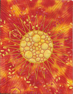 sizzling sun applique quilt panel
